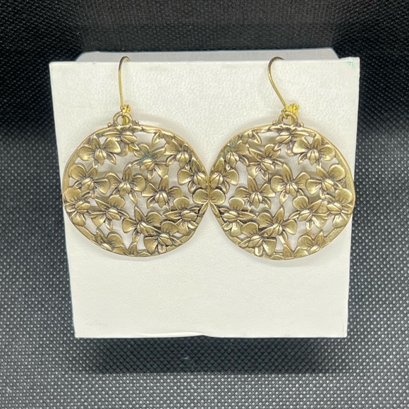 Vintage brassy toned orchid collage round dangle earrings. - Picture 4 of 6